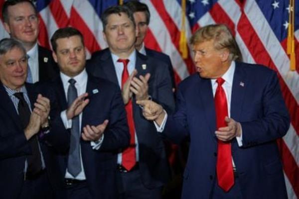 Republican presidential candidate and former U.S. president Do<em></em>nald Trump speaks during his caucus night watch party in Des Moines, Iowa, U.S., January 15, 2024.  